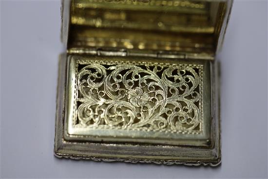 A George IV silver gilt rectangular vinaigrette by Nathaniel Mills, in original fitted leather box, 38mm.